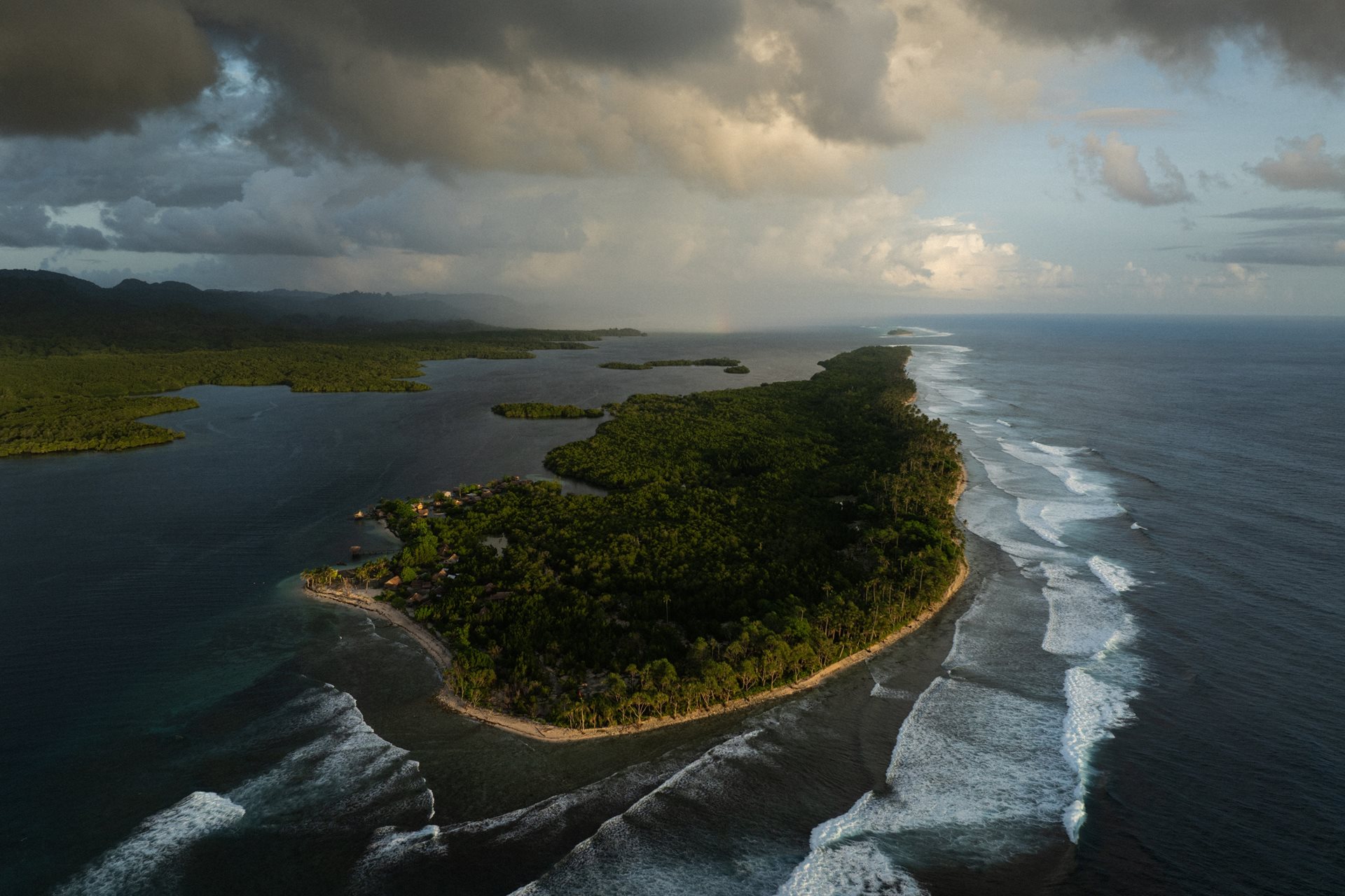 Fanalei Island in South Malaita, Solomon Islands has been reduced to a narrow strip of sand and coral by rising seas. Residents believe the settlement, once home to dozens of families, will become uninhabitable in the near future.